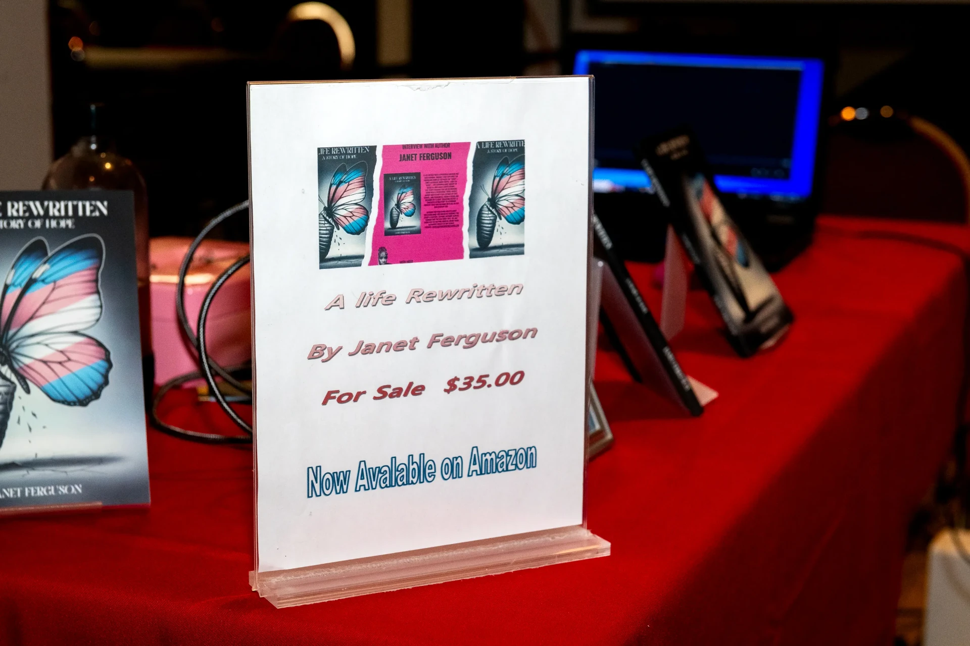Sign announcing A Life Rewritten for sale, available on Amazon